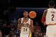 February 24, 2012; Orlando FL, USA; Team Chuck guard Kyrie Irving of the Cleveland Cavaliers (2) passes to teammate guard Paul George of the Indiana Pacers (24) during the first half of the BBVA rising stars challenge at the Amway Center in Orlando. Manda