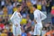 BARCELONA, SPAIN - OCTOBER 26: Gareth Bale (R) of Real Madrid CF talks to Cristiano Ronaldo after Barcelona scored their opening goal during the La Liga match between FC Barcelona and Real Madrid CF at Camp Nou stadium on October 26, 2013 in Barcelona, S