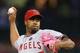 ARLINGTON, TX - SEPTEMBER 26: Jerome Williams #57 of the Los Angeles Angels throws against the Texas Rangers in the first inning at Rangers Ballpark in Arlington on September 26, 2013 in Arlington, Texas. (Photo by Ronald Martinez/Getty Images)
