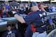 CHICAGO, IL - SEPTEMBER 22: Brian McCann #16 of the Atlanta Braves is cheered by Braves fans after a win on September 22, 2013 at Wrigley Field in Chicago, Illinois. The Atlanta Braves defeated the Chicago Cubs 5-2 to clinch the National League East Champ