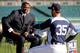 DETROIT, MI - OCTOBER 27: Harold Reynolds (L) of the MLB network talks with Detroit Tigers starting pitcher Justin Verlander #35 prior to the Tigers hosting the San Francisco Giants during Game Three of the Major League Baseball World Series at Comerica