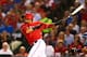 ARLINGTON, TX - SEPTEMBER 30: Nelson Cruz #17 of the Texas Rangers hits a line drive for an out against the Tampa Bay Rays during the American League Wild Card tiebreaker game at Rangers Ballpark in Arlington on September 30, 2013 in Arlington, Texas. (