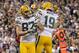 MINNEAPOLIS, MN - OCTOBER 27: Jordy Nelson #87 and Myles White #19 of the Green Bay Packers celebrate a touchdown against the Minnesota Vikings by Nelson during the first quarter of the game on October 27, 2013 at Mall of America Field at the Hubert H. Hu