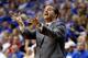 LEXINGTON, KY - NOVEMBER 01: John Calipari the head coach of the Kentucky Wildcats gives instructions to his team during the exhibition game against the Transylvania Pioneers at Rupp Arena on November 1, 2013 in Lexington, Kentucky. (Photo by Andy Lyons