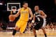 LOS ANGELES, CA - NOVEMBER 01: Jordan Farmar #1 of the Los Angeles Lakers drives against Patty Mills #8 of the San Antonio Spurs at Staples Center on November 1, 2013 in Los Angeles, California. The Spurs won 91-85. NOTE TO USER: User expressly acknowle