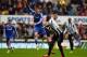 NEWCASTLE UPON TYNE, ENGLAND - NOVEMBER 02: Andre Schurrle of Chelsea and Davide Santon of Newcastle United battle for the ball during the Barclays Premier League match between Newcastle United and Chelsea at St James' Park on November 2, 2013 in Newcast