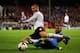 LONDON, ENGLAND - OCTOBER 21: Pajtim Kasami of Fulham is tackled by Jason Puncheon of Crystal Palace during the Barclays Premier League match between Crystal Palace and Fulham at Selhurst Park on October 21, 2013 in London, England. (Photo by Clive Rose