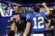 Oct 20, 2013; Indianapolis, IN, USA; Indianapolis Colts quarterback Andrew Luck (12) waves to the crowd as he leaves the field after the game against the Denver Broncos at Lucas Oil Stadium. Mandatory Credit: Ron Chenoy-USA TODAY Sports