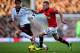 LONDON, ENGLAND - NOVEMBER 02: Bryan Ruiz of Fulham and Tom Cleverley of Manchester United compete for the ball during the Barclays Premier League match between Fulham and Manchester United at Craven Cottage on November 2, 2013 in London, England. (Phot