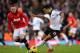 LONDON, ENGLAND - NOVEMBER 02: Wayne Rooney of Manchester United marshalls Kieran Richardson of Fulham during the Barclays Premier League match between Fulham and Manchester United at Craven Cottage on November 2, 2013 in London, England. (Photo by Cliv