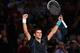 PARIS, FRANCE - NOVEMBER 02: Novak Djokovic of Serbia celebrates defeating Roger Federer of Switzerland during day six of the BNP Paribas Masters at Palais Omnisports de Bercy on November 2, 2013 in Paris, France. (Photo by Julian Finney/Getty Images)