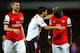 LONDON, ENGLAND - NOVEMBER 02: Per Mertesacker (L) looks over to Bacary Sagna of Arsenal as he clashes with Luis Suarez of Liverpool during the Barclays Premier League match between Arsenal and Liverpool at Emirates Stadium on November 2, 2013 in London,