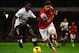 LONDON, ENGLAND - NOVEMBER 02: Kolo Toure of Liverpool marshalls Olivier Giroud of Arsenal during the Barclays Premier League match between Arsenal and Liverpool at Emirates Stadium on November 2, 2013 in London, England. (Photo by Laurence Griffiths/Get