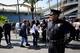 LOS ANGELES, CA - APRIL 10: A Los Angeles Police Department officers stands guard at the ticket counter in the parking lot of Dodger Stadium prior to the home opener aginst the Pittsburgh Pirates on April 10, 2012 in Los Angeles, California. Security wa