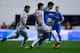MADRID, SPAIN - NOVEMBER 02: Cristiano Ronaldo (R) of Real Madrid CF competes for the ball with Roberto Roman (2L) of Rayo Vallecano de Madrid and his team mate Roberto Tashorras (L) during the La Liga match between Rayo Vallecano de Madrid and Real Madri