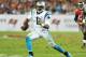 TAMPA, FL - OCTOBER 24: Quarterback Cam Newton #1 of the Carolina Pantherz runs upfield in the 2nd half against the Tampa Bay Buccaneers October 24, 2013 at Raymond James Stadium in Tampa, Florida. Carolina won 31 - 13. (Photo by Al Messerschmidt/Getty I