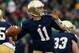 SOUTH BEND, IN - NOVEMBER 02: Tommy Rees #11 of the Notre Dame Fighting Irish passes against the Navy Midshipmen at Notre Dame Stadium on November 2, 2013 in South Bend, Indiana. (Photo by Jonathan Daniel/Getty Images)
