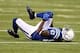 Oct 20, 2013; Indianapolis, IN, USA; Indianapolis Colts wide receiver Reggie Wayne (87) reacts after sustaining an injury against the Denver Broncos in the 2nd half during the game at Lucas Oil Stadium. Mandatory Credit: Brian Spurlock-USA TODAY Sports