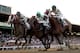 ARCADIA, CA - NOVEMBER 02: Mucho Macho Man (right), riden by Gary Stevens crosses the finish line ahead of Will Take Charge, riden by Luis Saez and Declaration of War, riden by Joseph O'Brien, to win the Breeders' Cup Classic during the 2013 Breeders' Cu