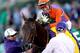 Gary Stevens celebrates Beholder's win in the Distaff.