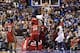 Oct 30, 2013; Philadelphia, PA, USA; Philadelphia 76ers guard Michael Carter-Williams (1) dunks over Miami Heat center Chris Bosh (1) during the first quarter at Wells Fargo Center. Mandatory Credit: Howard Smith-USA TODAY Sports