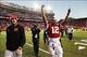 Nov 2, 2013; Lincoln, NE, USA; Nebraska Cornhuskers quarterback Tommy Armstrong Jr. (4) and Taylor Martinez (left) celebrate after defeating the Northwestern Wildcats at Memorial Stadium. Nebraska won 27-24. Mandatory Credit: Bruce Thorson-USA TODAY Sport