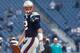 FOXBORO, MA - OCTOBER 27: Tom Brady #12 of the New England Patriots walks the field before a game with the Miami Dolphins at Gillette Stadium on October 27, 2013 in Foxboro, Massachusetts. (Photo by Jim Rogash/Getty Images)