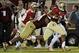 Nov 2, 2013; Tallahassee, FL, USA; Florida State Seminoles running back Devonta Freeman (8) runs the ball for a touchdown against the Miami Hurricanes during the first half at Doak Campbell Stadium. Mandatory Credit: Melina Vastola-USA TODAY Sports
