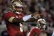 Nov 2, 2013; Tallahassee, FL, USA; Florida State Seminoles quarterback Jameis Winston (5) before a snap during the first half against the Miami Hurricanes during the first half at Doak Campbell Stadium. Mandatory Credit: Melina Vastola-USA TODAY Sports