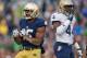 Nov 2, 2013; South Bend, IN, USA; Notre Dame Fighting Irish running back Tarean Folston (25) celebrates in the second quarter against the Navy Midshipmen at Notre Dame Stadium. Notre Dame won 38-34. Mandatory Credit: Matt Cashore-USA TODAY Sports