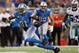 DETROIT, MI - OCTOBER 27: Calvin Johnson #81 of the Detroit Lions runs for extra yards after a third quarter catch while playing the Dallas Cowboys at Ford Field on October 27, 2013 in Detroit, Michigan. Detroit won the game 31-30. (Photo by Gregory Shamu