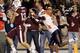 COLLEGE STATION, TX - NOVEMBER 02: Mike Evans #13 of the Texas A&M Aggies scores in the fourth quarter as he beats Ishmael Harrison #2 of the UTEP Miners on the play at Kyle Field on November 2, 2013 in College Station, Texas. (Photo by Bob Levey/Getty