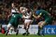 LEICESTER, ENGLAND - NOVEMBER 2: Tom Guest of Harlequins crunches into Logovii Mulipola and Graham Kitchener of Leicester Tigers during the Aviva Premiership match between Leicester Tigers and Harlequins at Welford Road on November 2, 2013 in Leicester,