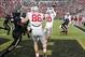 Nov 2, 2013; West Lafayette, IN, USA; Ohio State Buckeyes quarterback Braxton Miller (5) throws a touchdown pass to wide receiver Corey Brown (10) against the Purdue Boilermakers at Ross Ade Stadium. Ohio State defeats Purdue 56-0. Mandatory Credit: Brian
