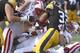 IOWA CITY, IA - NOVEMBER 2: Running back Jordan Canzeri #33 of the Iowa Hawkeyes is brought down during the fourth quarter by safety Dezmen Southward #12, linebackers Conor O'Neill and Marcus Trotter #59 of the Wisconsin Badgers on November 2, 2013 at Ki