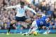 LIVERPOOL, ENGLAND - NOVEMBER 03: Seamus Coleman of Everton tackled by Paulinho of Tottenham Hotspur during the Barclays Premier League match between Everton and Tottenham Hotspur at Goodison Park on November 3, 2013 in Liverpool, England. (Photo by Ton