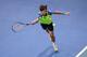 PARIS, FRANCE - NOVEMBER 03: David Ferrer of Spain in action against Novak Djokovic of Serbia in the final during day seven of the BNP Paribas Masters at Palais Omnisports de Bercy on November 3, 2013 in Paris, France. (Photo by Julian Finney/Getty Imag