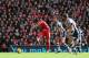 LIVERPOOL, ENGLAND - OCTOBER 26: Luis Suarez of Liverpool scores the opening goal during the Barclays Premier League match between Liverpool and West Bromwich Albion at Anfield on October 26, 2013 in Liverpool, England. (Photo by Clive Brunskill/Getty I