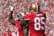 SAN FRANCISCO, CA - SEPTEMBER 08: Vernon Davis (R) #85 and Frank Gore #21 of the San Francisco 49ers celebrate Gore's touchdown in the fourth quarter against the Green Bay Packers at Candlestick Park on September 8, 2013 in San Francisco, California. The