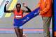 NEW YORK, NY - NOVEMBER 03: Priscah Jeptoo of Kenya crosses the finish line in Central Park to win the 2013 ING New York City Marathon on November 3, 2013 in New York City. (Photo by Elsa/Getty Images)