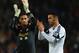 CARDIFF, WALES - NOVEMBER 03: Angel Rangel and Alvaro Vazquez of Swansea show their dissapointment after defeat in the Barclays Premier League match between Cardiff City and Swansea at Cardiff City Stadium on November 3, 2013 in Cardiff, Wales. (Photo b