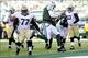 Nov 3, 2013; East Rutherford, NJ, USA; New York Jets quarterback Geno Smith (7) scores a touchdown against the New Orleans Saints during the first half at MetLife Stadium. Mandatory Credit: Joe Camporeale-USA TODAY Sports