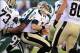 Nov 3, 2013; East Rutherford, NJ, USA; New Orleans Saints quarterback Drew Brees (9) fumbles the ball as he is sacked by New York Jets outside linebacker Calvin Pace (97) during the game at MetLife Stadium. Mandatory Credit: Robert Deutsch-USA TODAY Sport