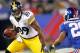 EAST RUTHERFORD, NJ - NOVEMBER 4: Wide receiver Jerricho Cotchery #89 of the Pittsburgh Steelers looks to get past Prince Amukamara #20 the New York Giants as he runs for a first down in the fourth quarter during an NFL game at MetLife Stadium on November