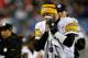 FOXBORO, MA - NOVEMBER 03: Ben Roethlisberger #7 of the Pittsburgh Steelers looks at an image on the sideline after losing posession on fourth down against the New England Patriots in the second quarter at Gillette Stadium on November 3, 2013 in Foxboro,