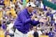 Oct 12, 2013; Baton Rouge, LA, USA; LSU Tigers head coach Les Miles and his coaching staff react from the sideline following a defensive stop against the Florida Gators during the second half of a game at Tiger Stadium. LSU defeated Florida 17-6. Mandator