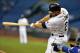 ST. PETERSBURG, FL - SEPTEMBER 17: Infielder James Loney #21 of the Tampa Bay Rays bats against the Texas Rangers September 17, 2013 at Tropicana Field in St. Petersburg, Florida. The Rangers won 7 - 1. (Photo by Al Messerschmidt/Getty Images)