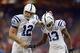 Nov 3, 2013; Houston, TX, USA; Indianapolis Colts quarterback Andrew Luck (12) talks to wide receiver T.Y. Hilton (13) against the Houston Texans before the game at Reliant Stadium. Mandatory Credit: Thomas Campbell-USA TODAY Sports