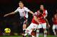 LONDON, ENGLAND - NOVEMBER 02: Lucas Leiva of Liverpool and Santi Cazorla of Arsenal battle for the ball during the Barclays Premier League match between Arsenal and Liverpool at Emirates Stadium on November 2, 2013 in London, England. (Photo by Laurenc