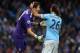 MANCHESTER, ENGLAND - NOVEMBER 02: Goal-keeper Costel Pantilimon of Manchester City is congratulated on a good save by Martin Demichelis (R) during the Barclays Premier League match between Manchester City and Norwich City at Etihad Stadium on November 2